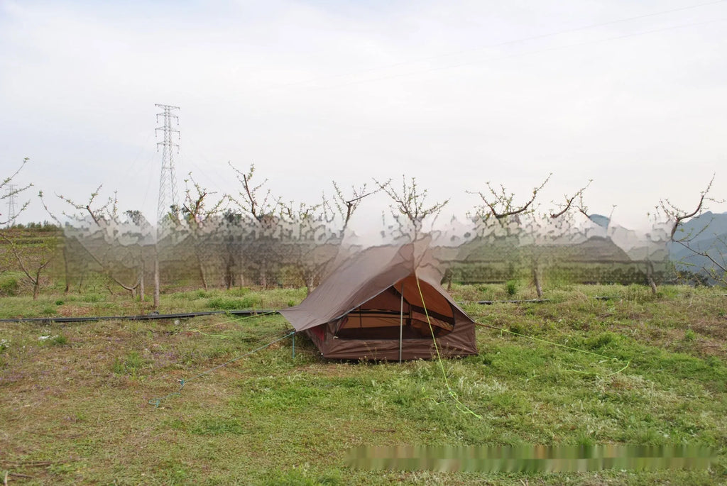 Brown or white A-line pole-free cabin tent for hiking, shown packed and pitched.
