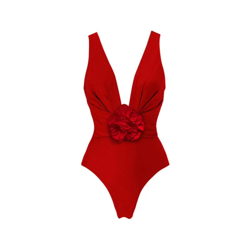 Red women's V-neck swimsuit with detachable floral skirt and open back halter design