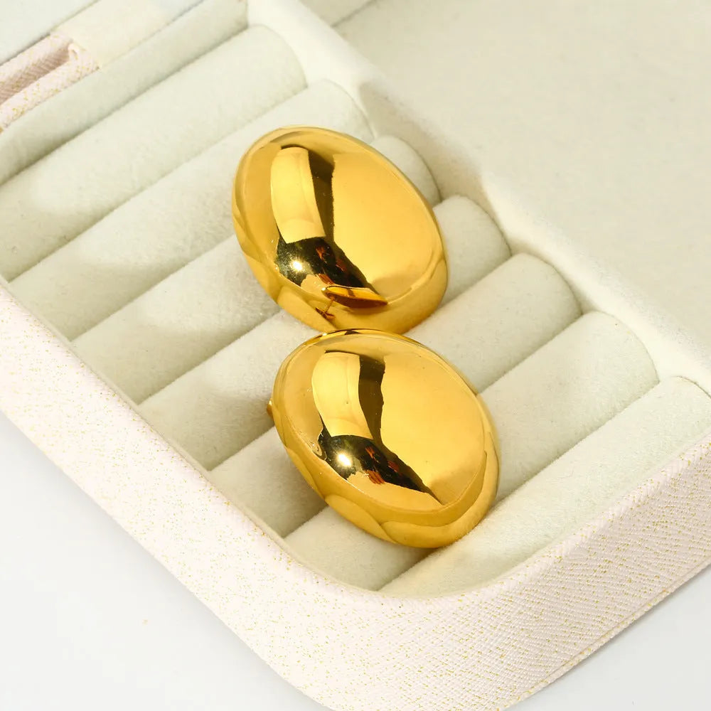 Geometric line ear studs with 18K gold electroplated finish and glazed surface on stainless steel