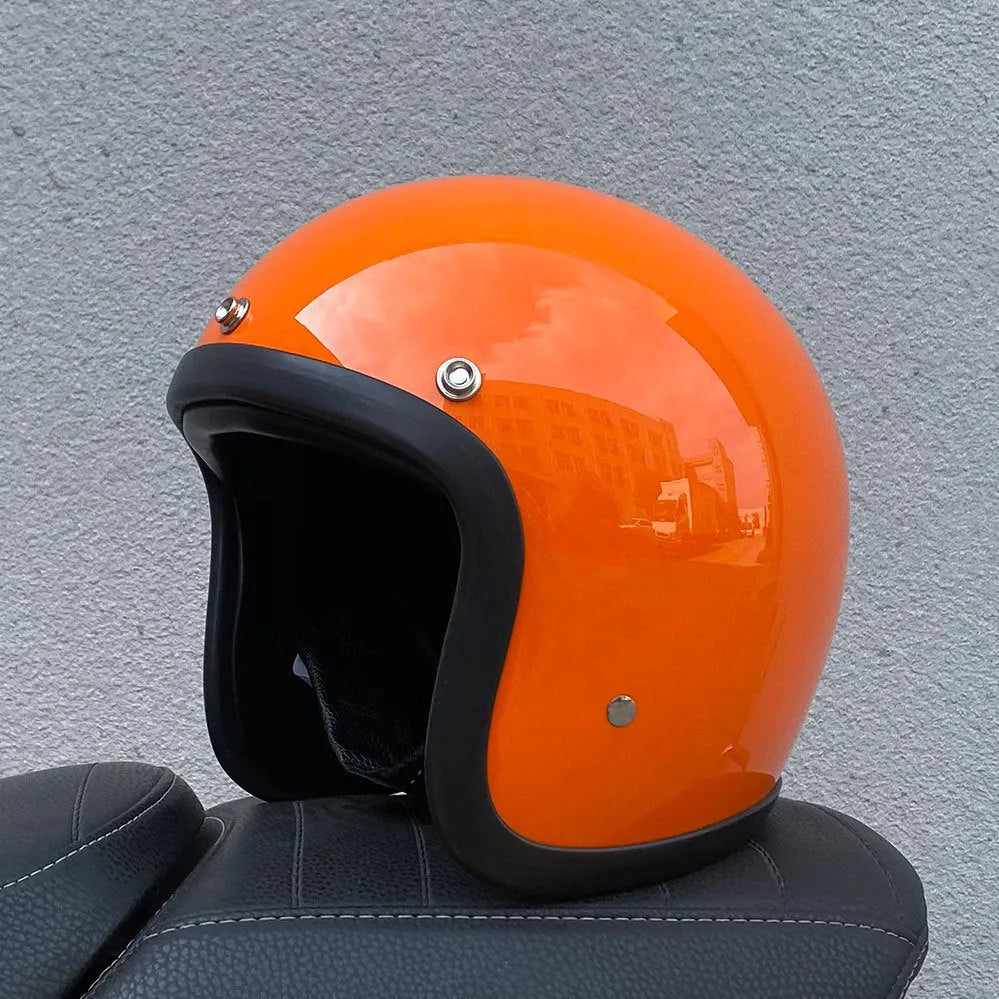 Retro-style half motorcycle helmet in fibreglass, shown in a cement grey colour option.