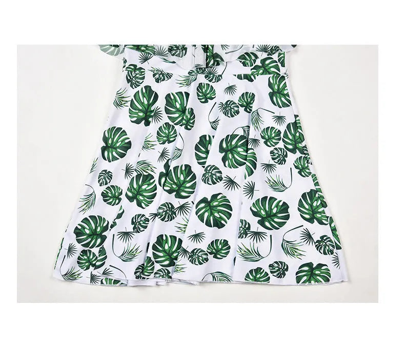Women's printed one-piece swimsuit in polyester with green leaf or black letter style options