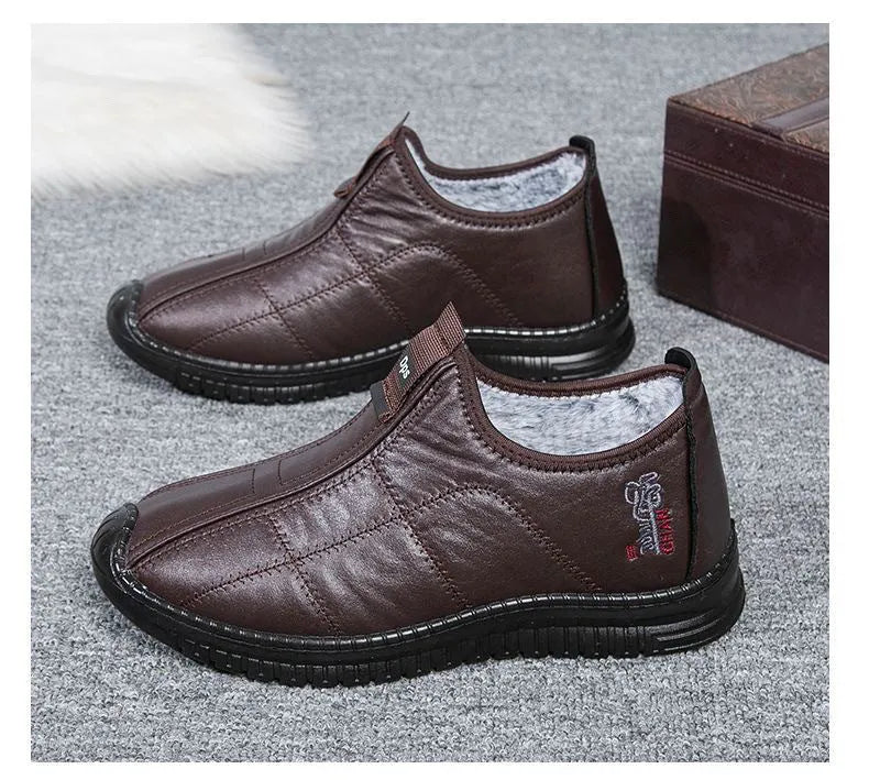 Men's brown winter cotton boots with a buckle fastening and a thick sole.