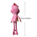 Pink squid-shaped dog chew toy with corduropy fabric, 32cm length with squeaker