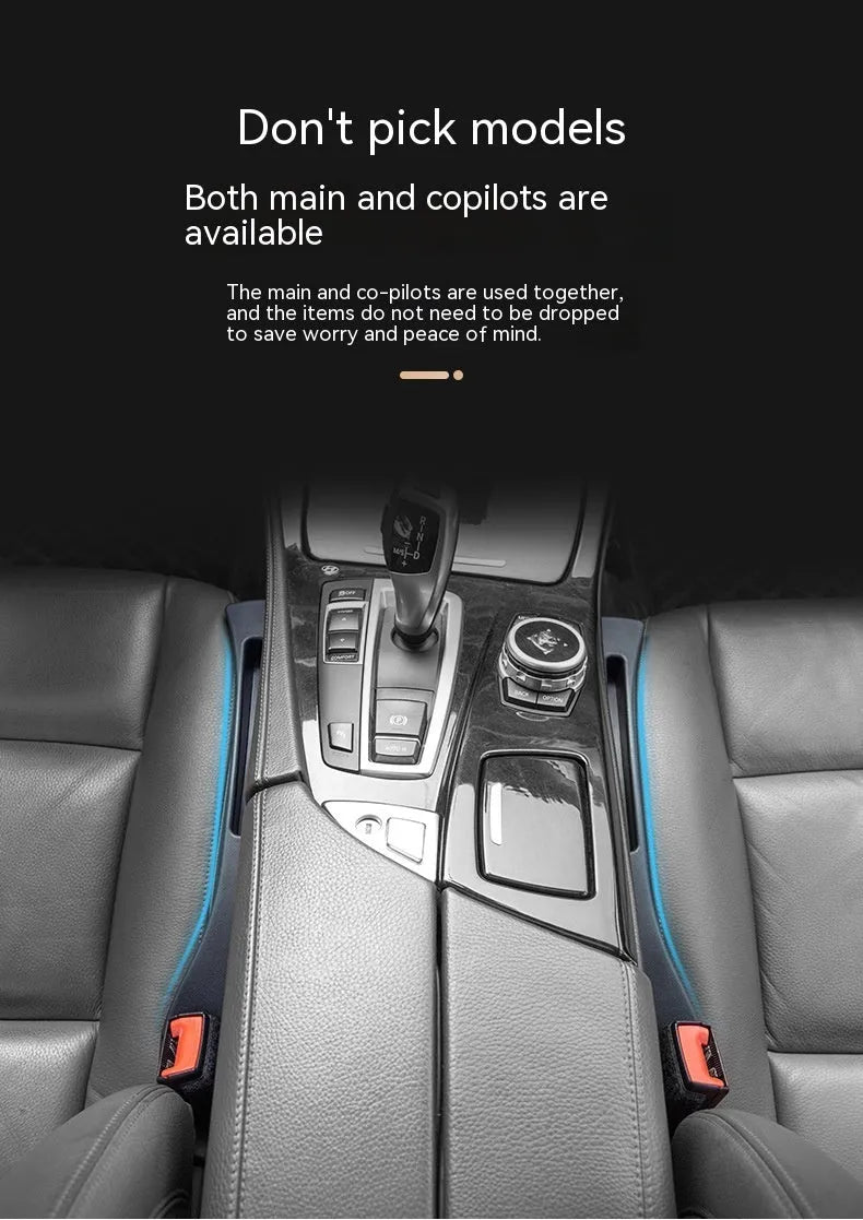 Black plastic car seat gap storage organiser box with handle inserted between car seat and centre console.