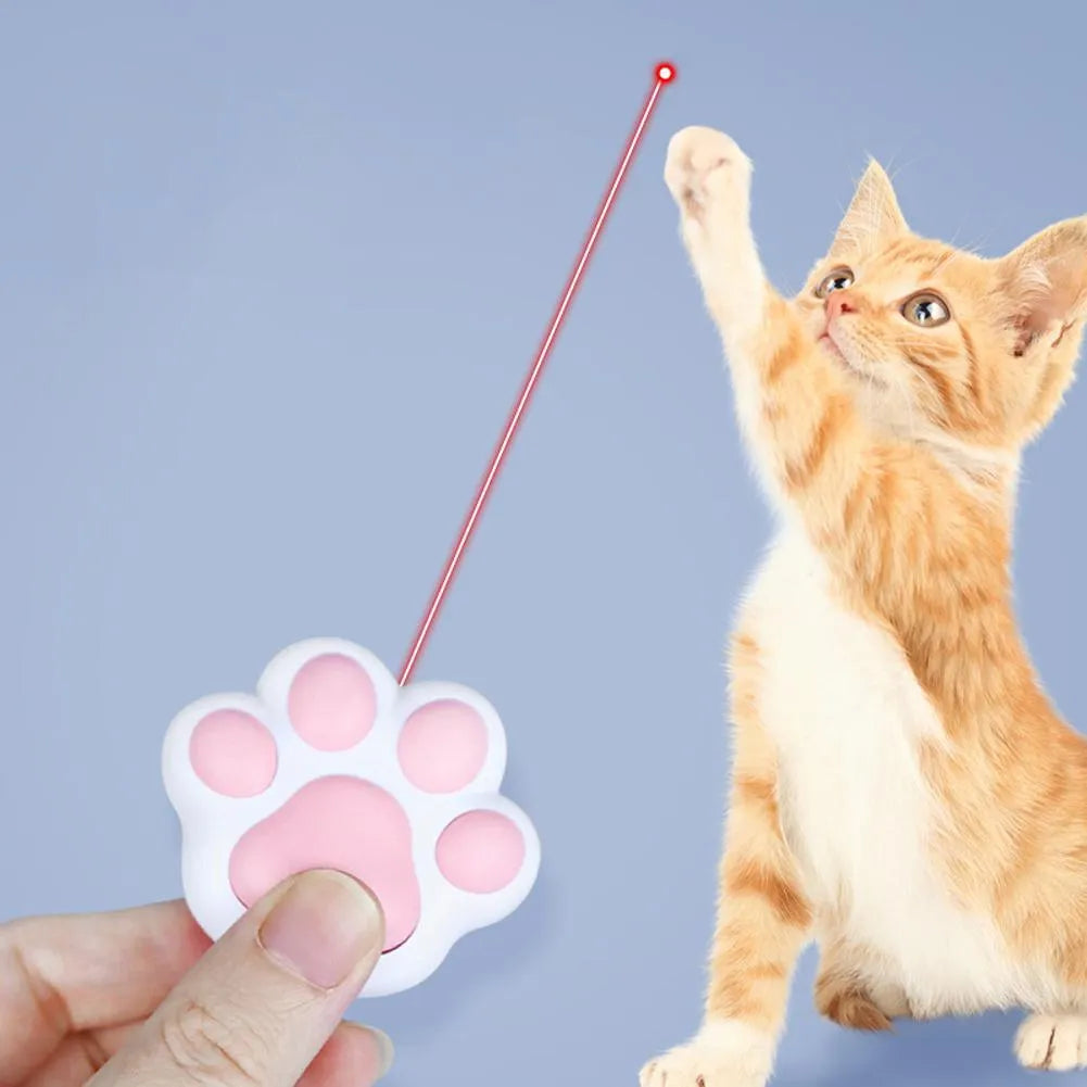 Pink and black USB rechargeable infrared cat teaser toy with keychain attachment