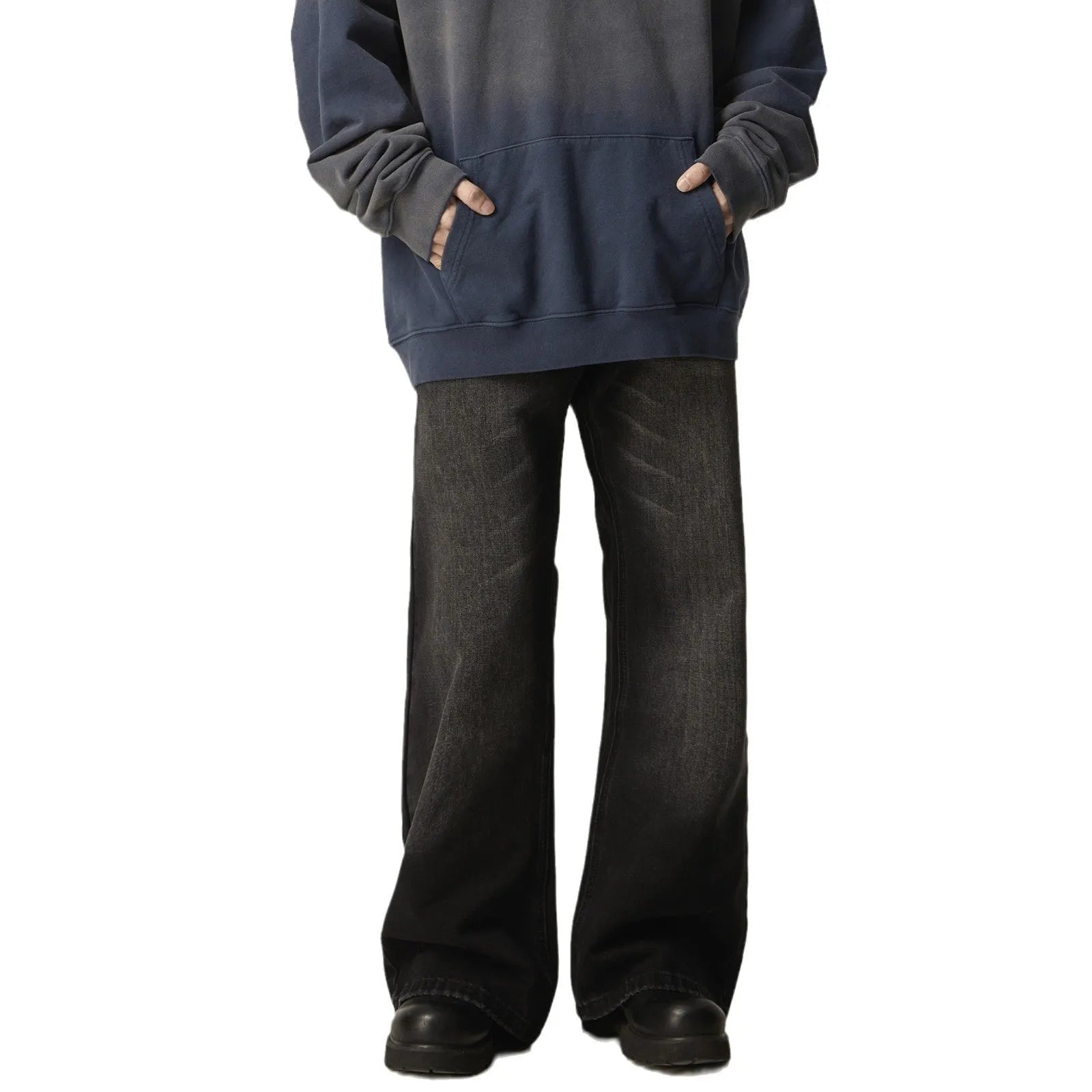 Black loose straight-leg retro jeans on a mannequin, showing zipper fly and relaxed fit.