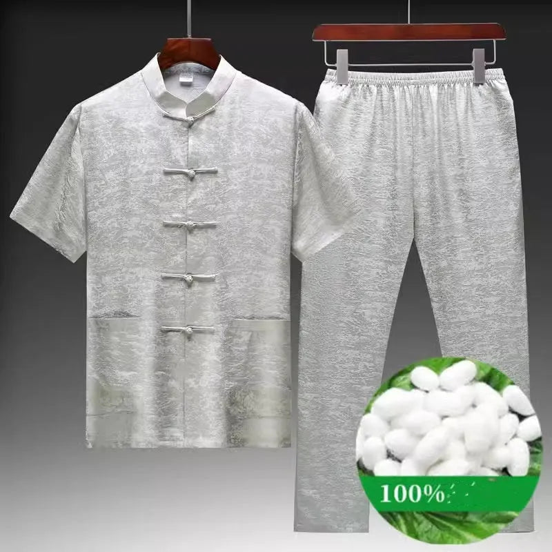Traditional Chinese-style men's Tang suit in mulberry silk fabric showing white, light green and navy blue colour options