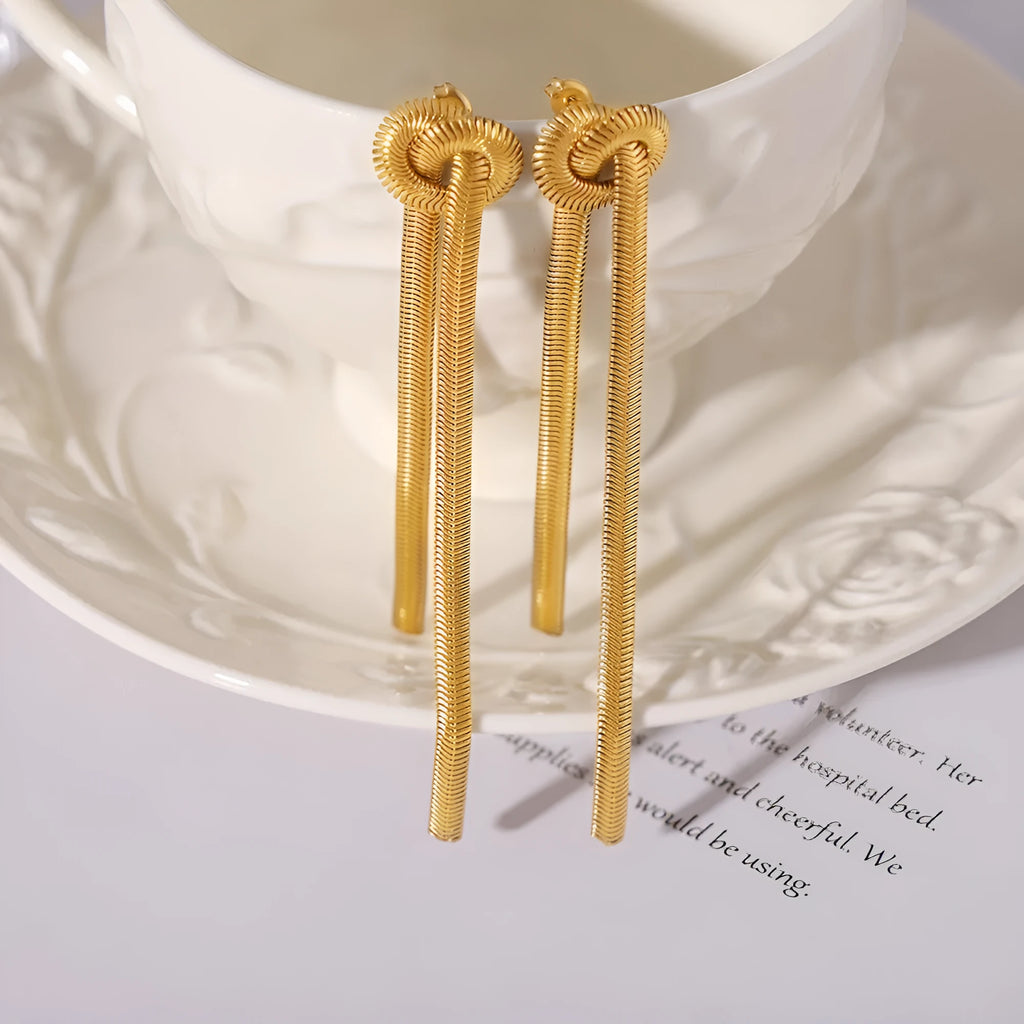 Gold knotted tassel necklace and matching earrings set on titanium steel snake chain