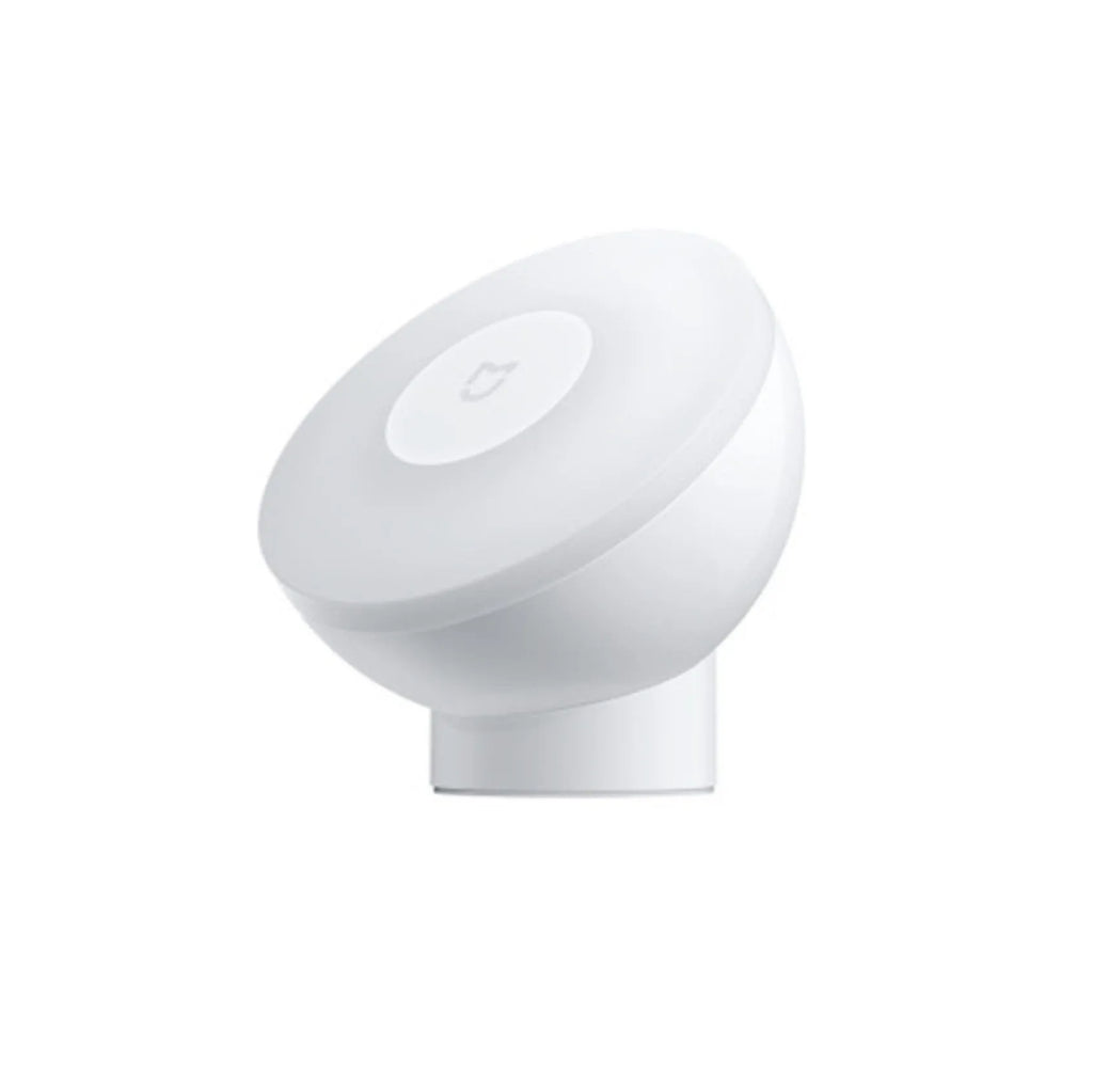 White modern Mijia Night Light 2 Bluetooth bedside lamp with motion sensor on a table.