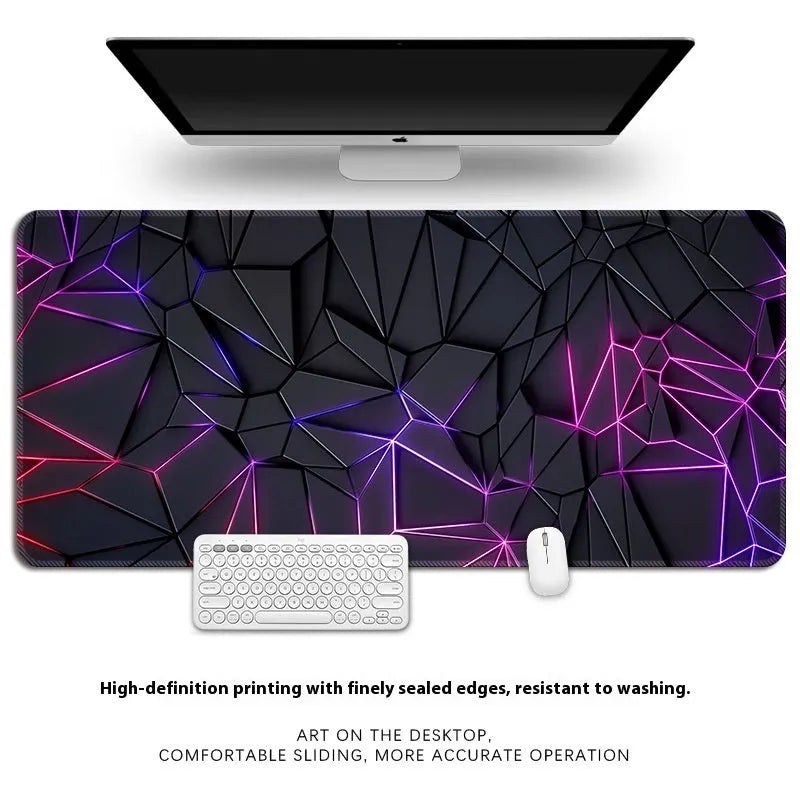 Natural rubber computer desk mat with printed pattern and overlock edge, shown on a wooden desk.