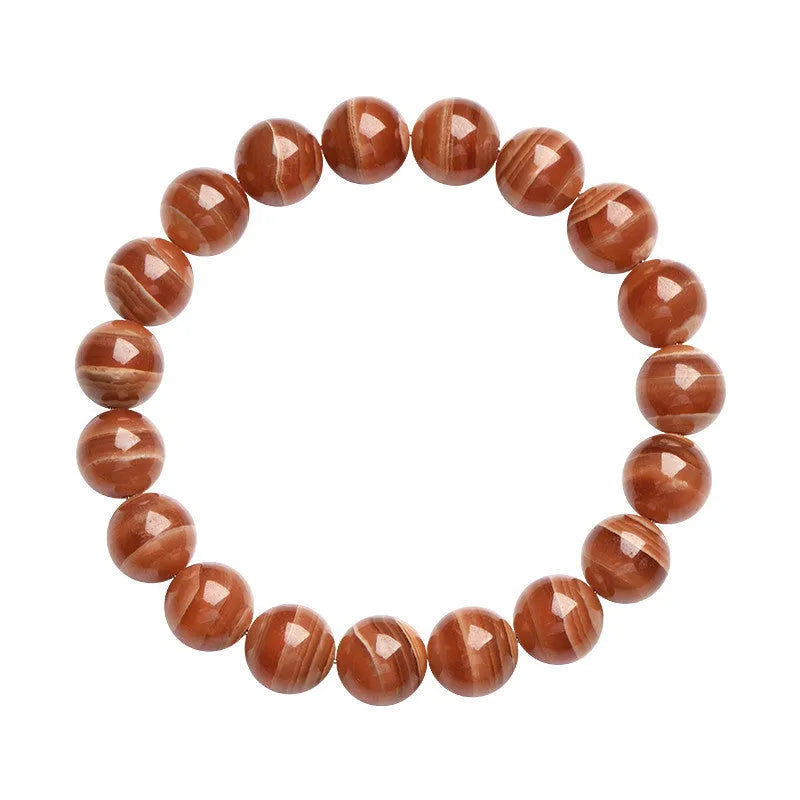 Natural old mine rhodochrosite round bead bracelet with geometric design and Ruyi elements.