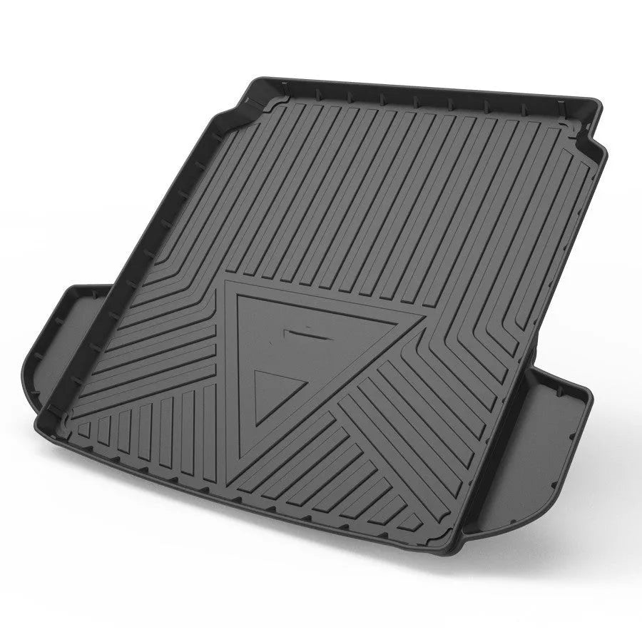 Black carbon fibre pattern TPE rubber boot liner mat for a car trunk.