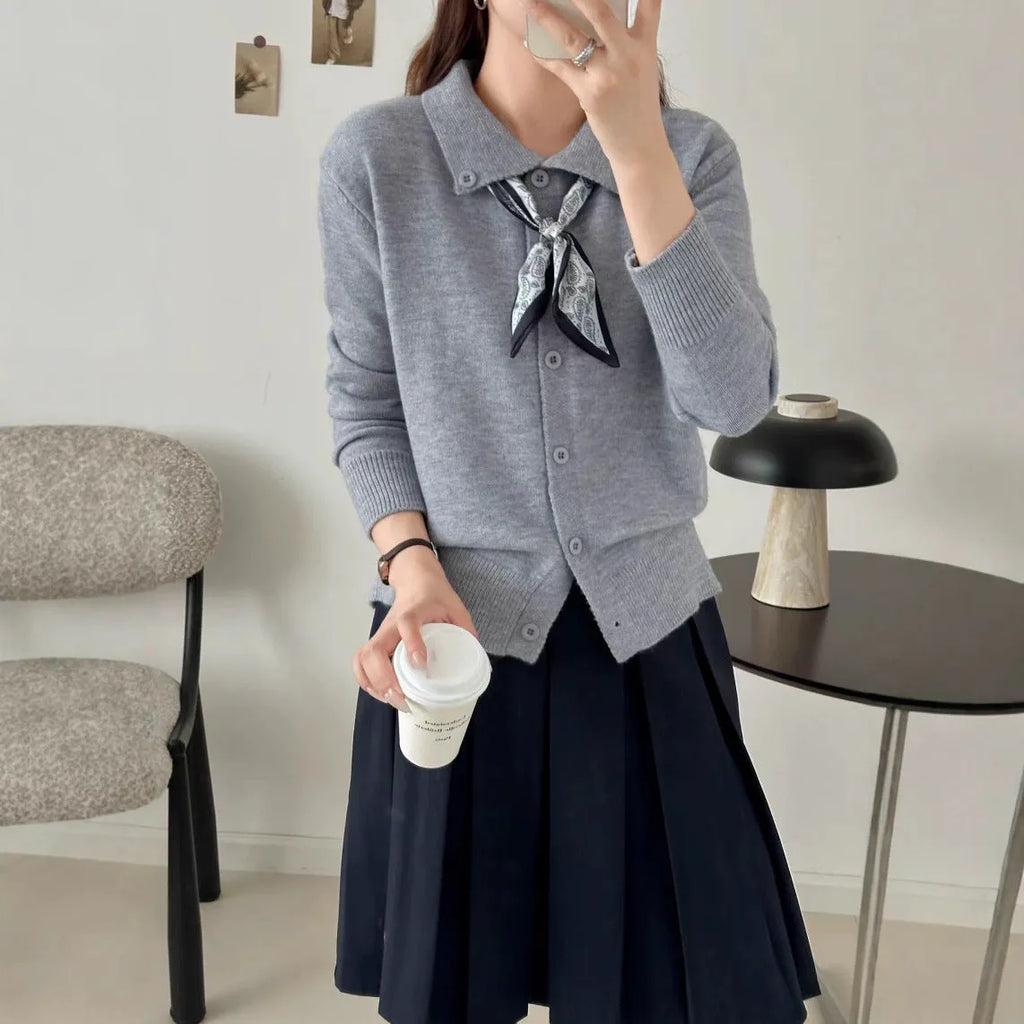 Women's milky white cardigan sweater with a built-in lapel scarf collar and long sleeves.