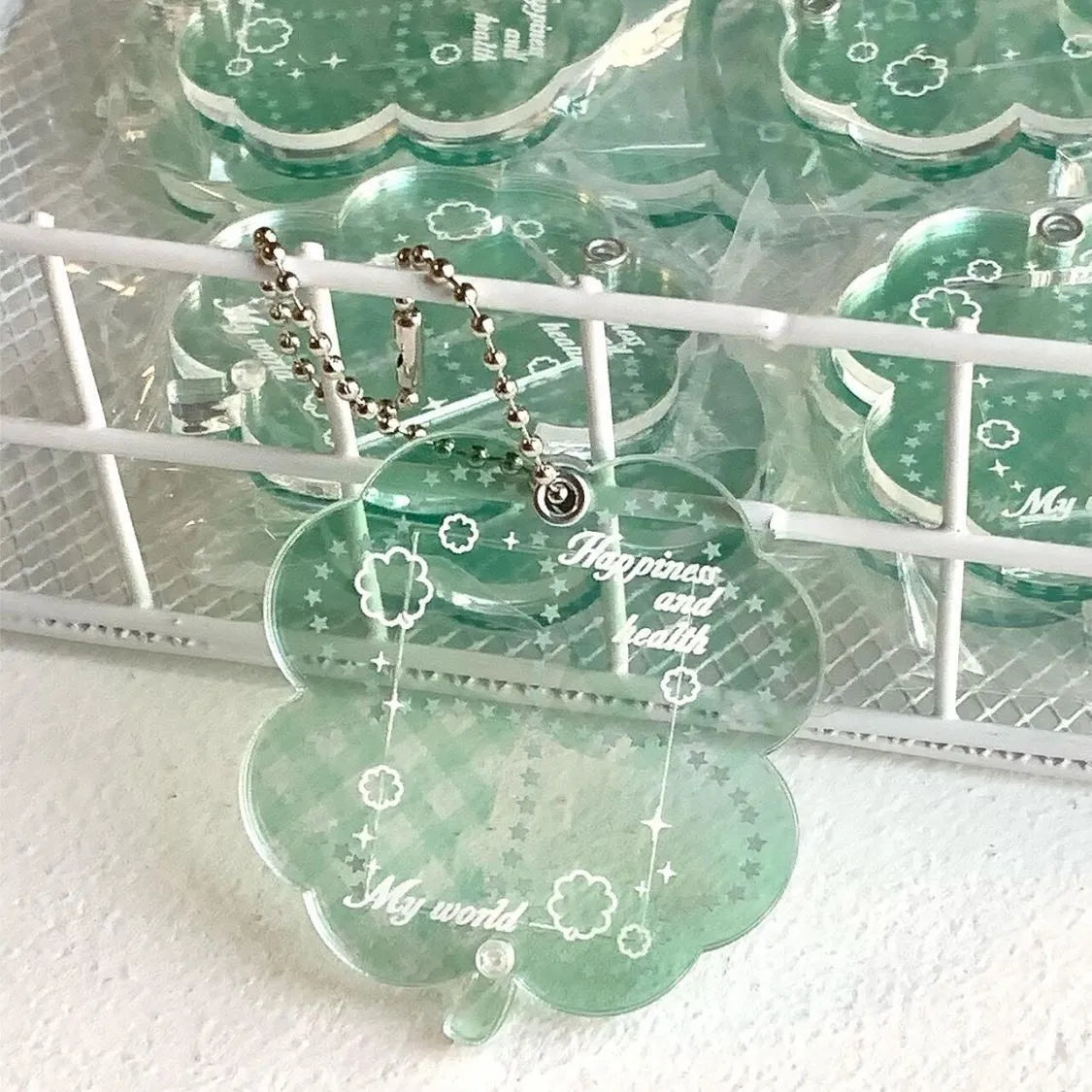 Acrylic four-leaf clover phone pendant keychain in blue and green colours