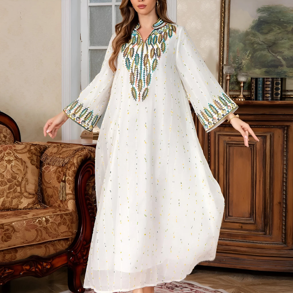 White traditional Dubai Arabic robe with long sleeves and floor-length design