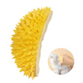 Yellow durian-shaped cat corner scratcher mounted on a wall with cat mint powder