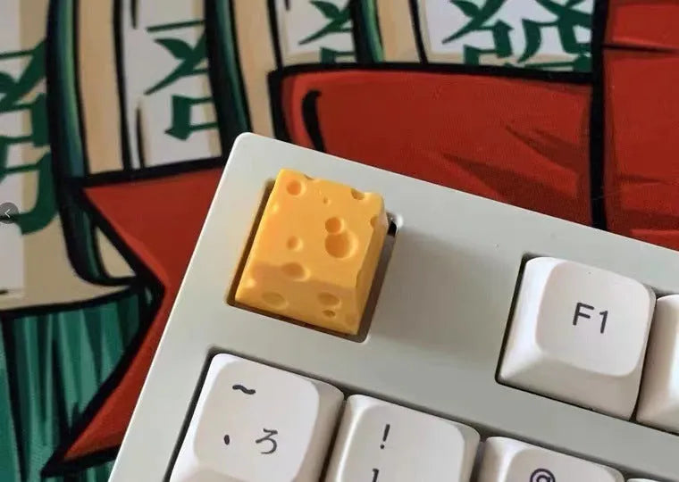 Yellow resin cheese wedge key cap for mechanical keyboards with detailed sculpting