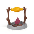 Tumbling barbecue-style cat feeder toy with leakage food dispenser, shown in plastic construction.