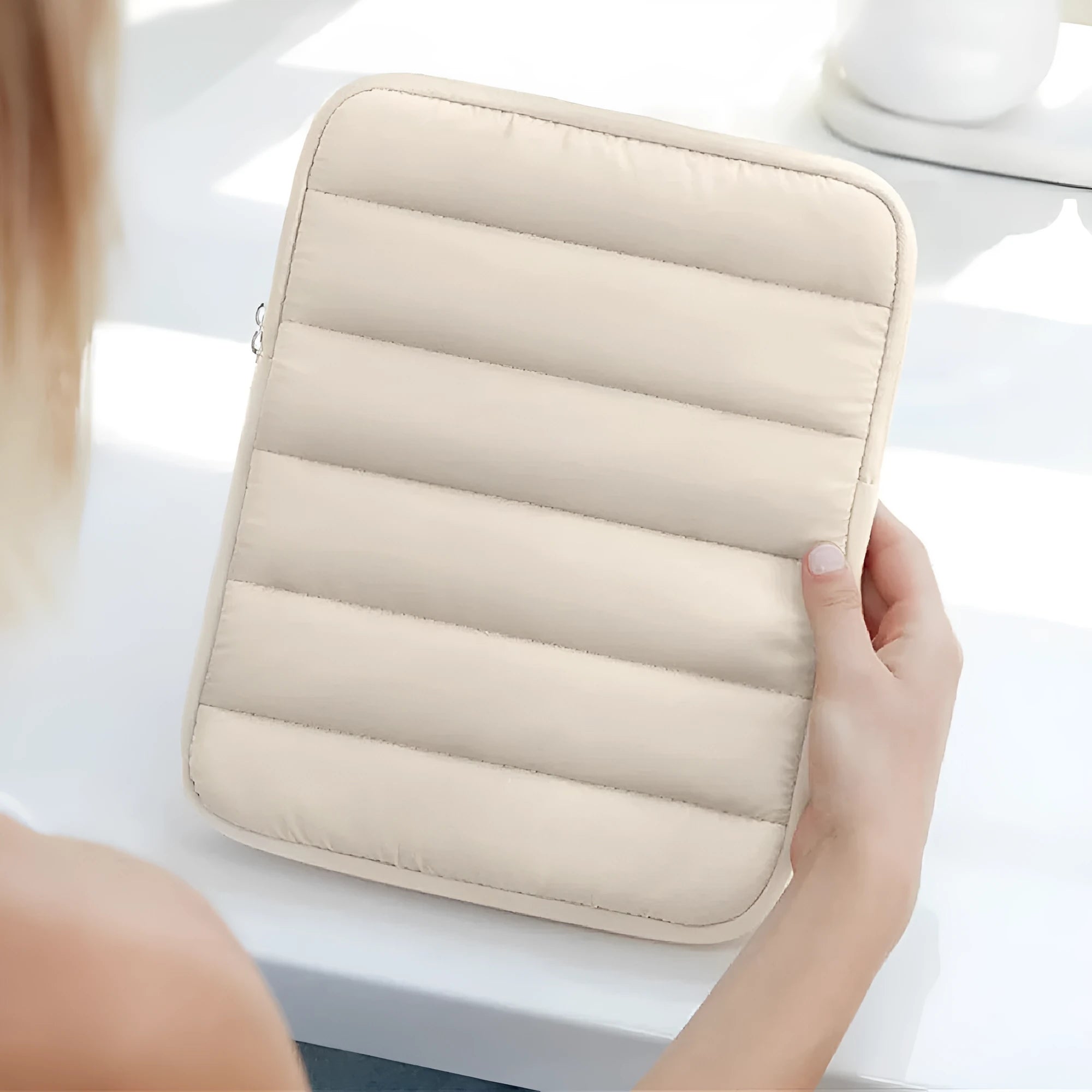 Fluffy padded laptop sleeve case for 9.7 to 11 inch devices in black, khaki, and silver colours.