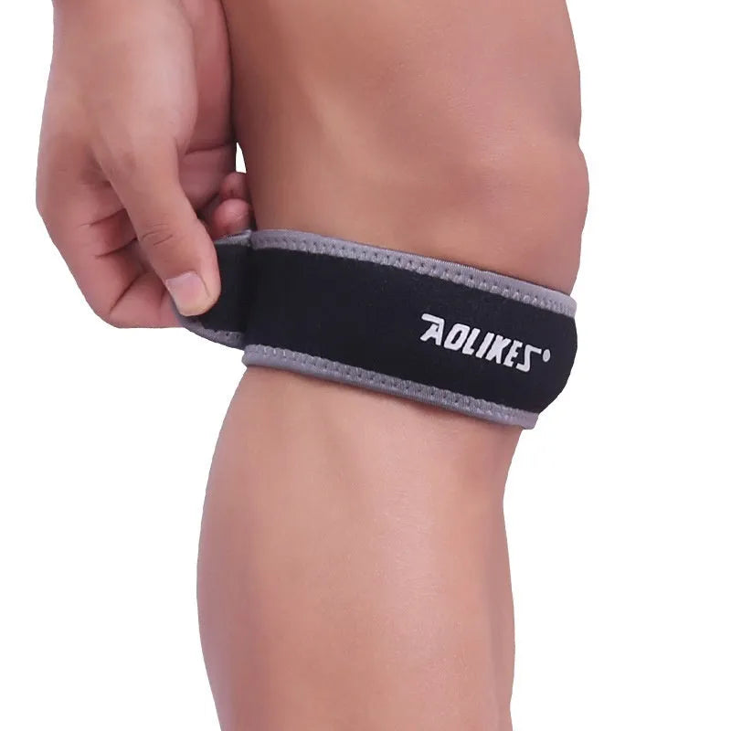 Black and grey patella retinaculum knee support strap for running, cycling and sports