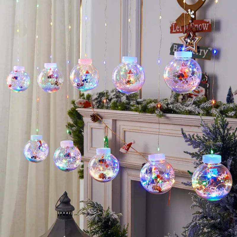 10-piece LED Christmas curtain light set with snowman, tree, and Santa ornaments for window decoration
