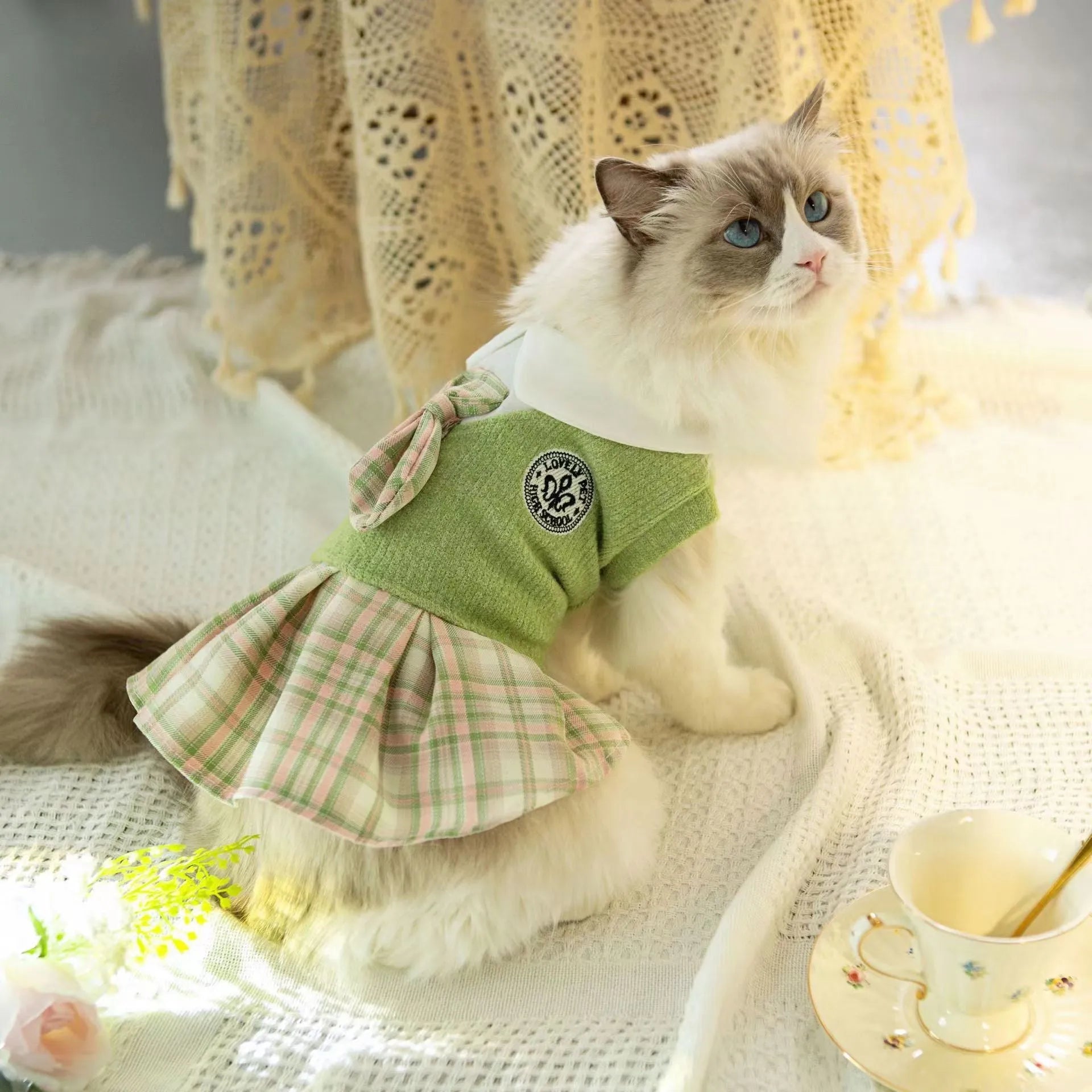 Tartan plaid princess skirt for a small dog or cat, shown in pink, blue, and green colour options.