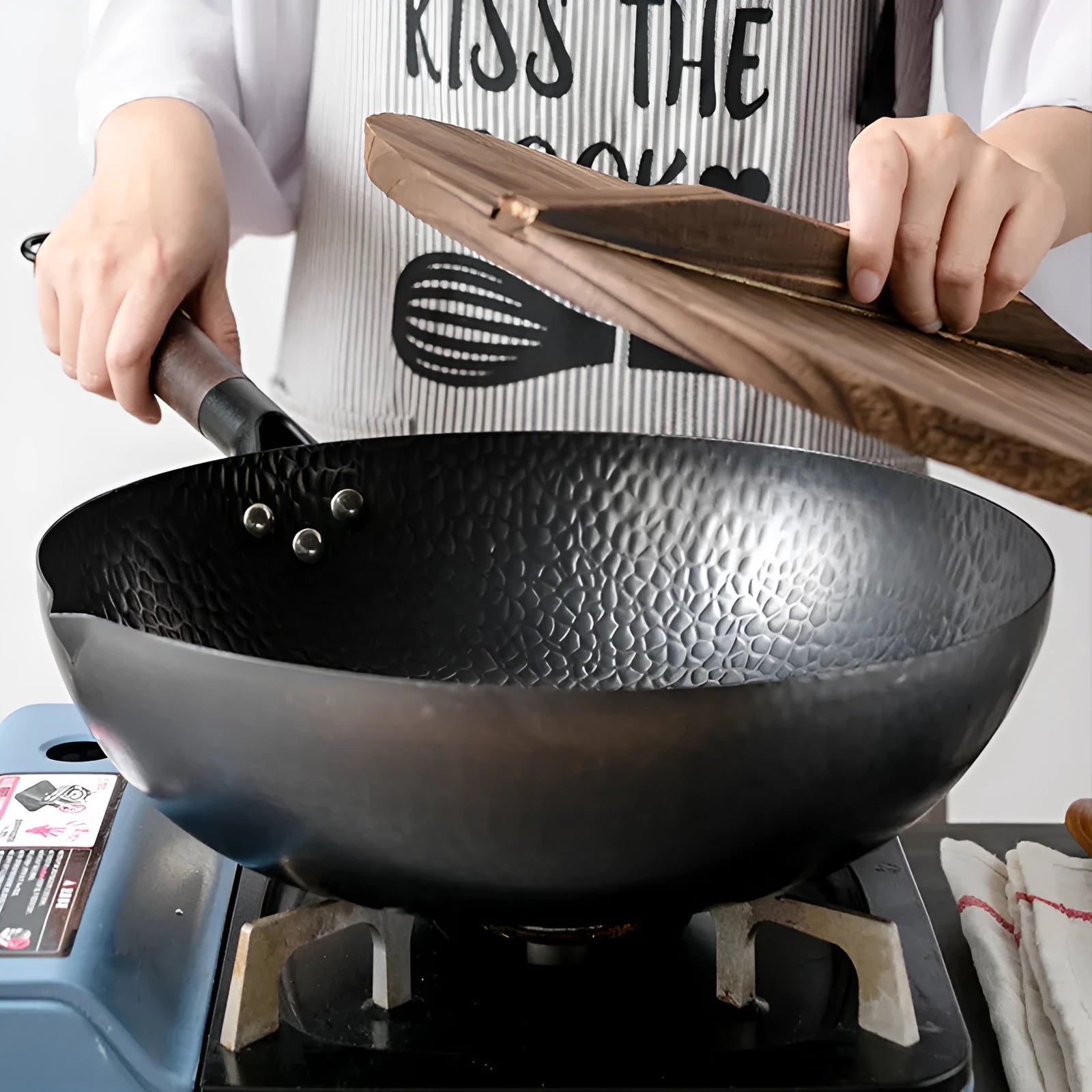 Traditional black iron wok with wooden handle, 40cm diameter, shown with glass lid option
