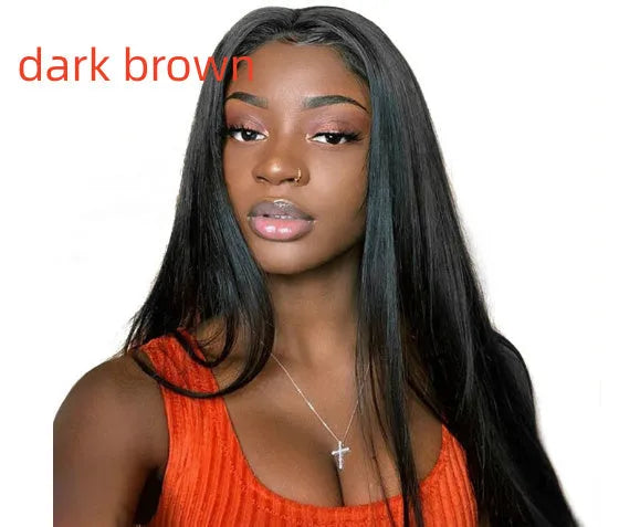 Long straight black synthetic wig with centre part and bangs on a model