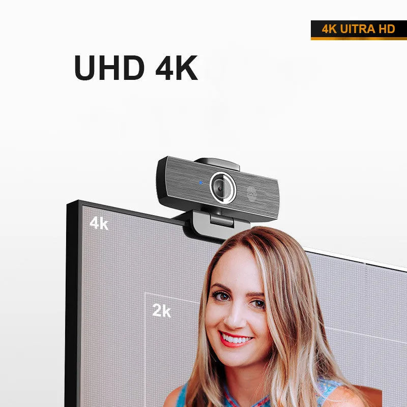 Black 8MP USB webcam with auto focus and a magnetic privacy cover on a desktop monitor.