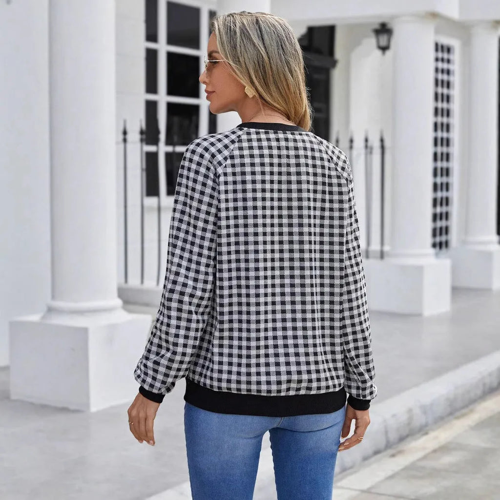 Black Japanese plaid pattern long sleeve polyester sweater showing front view with regular sleeves