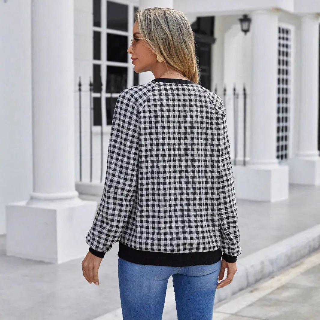 Black Japanese plaid pattern long sleeve polyester sweater showing front view with regular sleeves