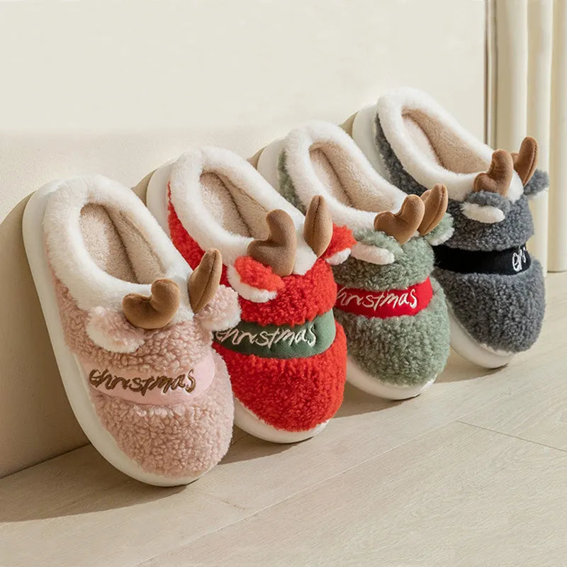 Christmas winter home slippers with suede upper and EVA sole in antler pink colour