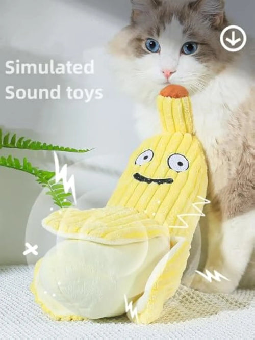 Yellow banana-shaped cat toy with crinkle paper sound feature measuring 13 inches long