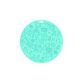 Round grey silicone pet lick mat with textured surface and a clear suction cup on its base.
