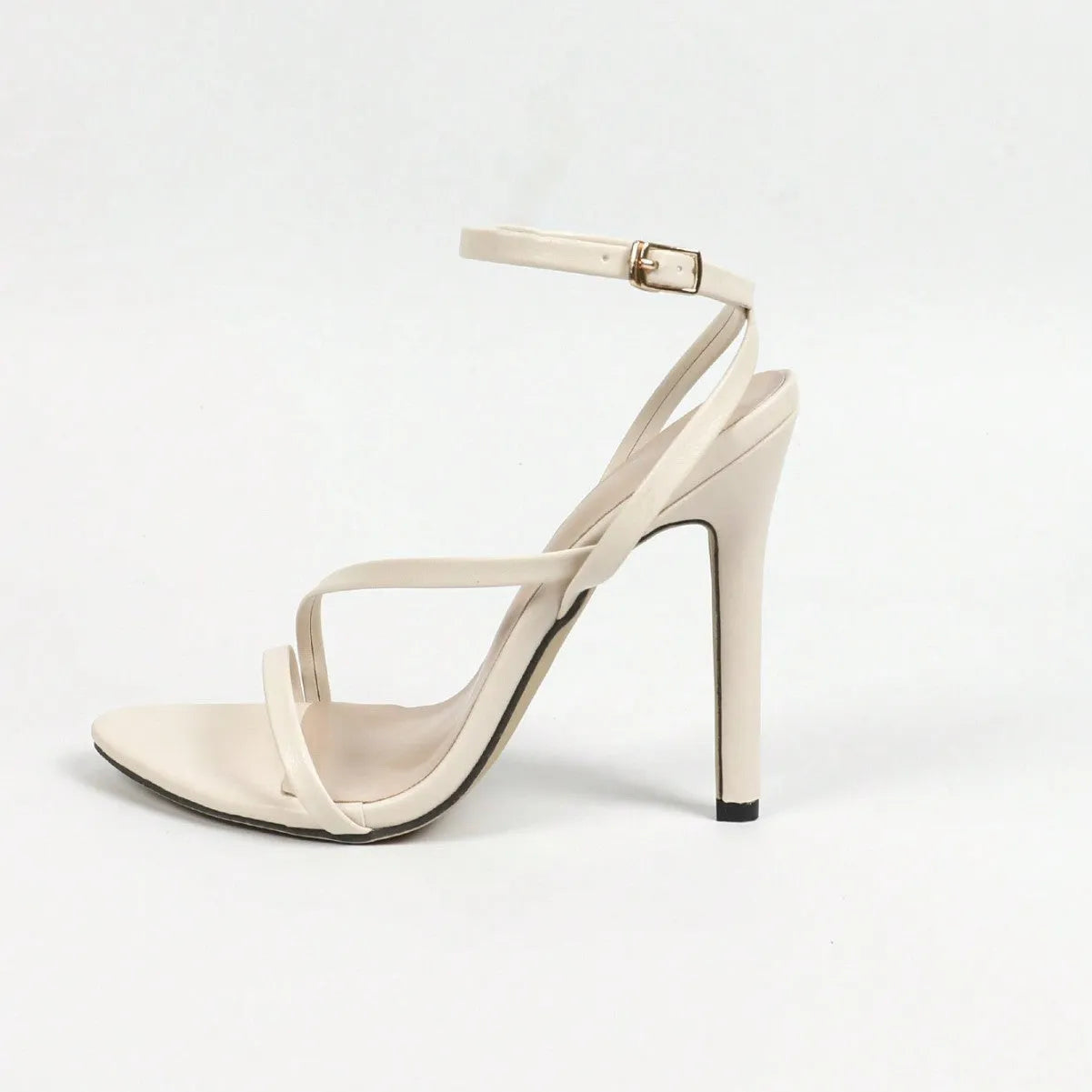 Women's open toe heels with ankle strap in gold colour showing round toe and multi-stripe detailing