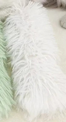 Blue, green, pink, and white plush cat toy pillow measuring 27cm by 10cm.