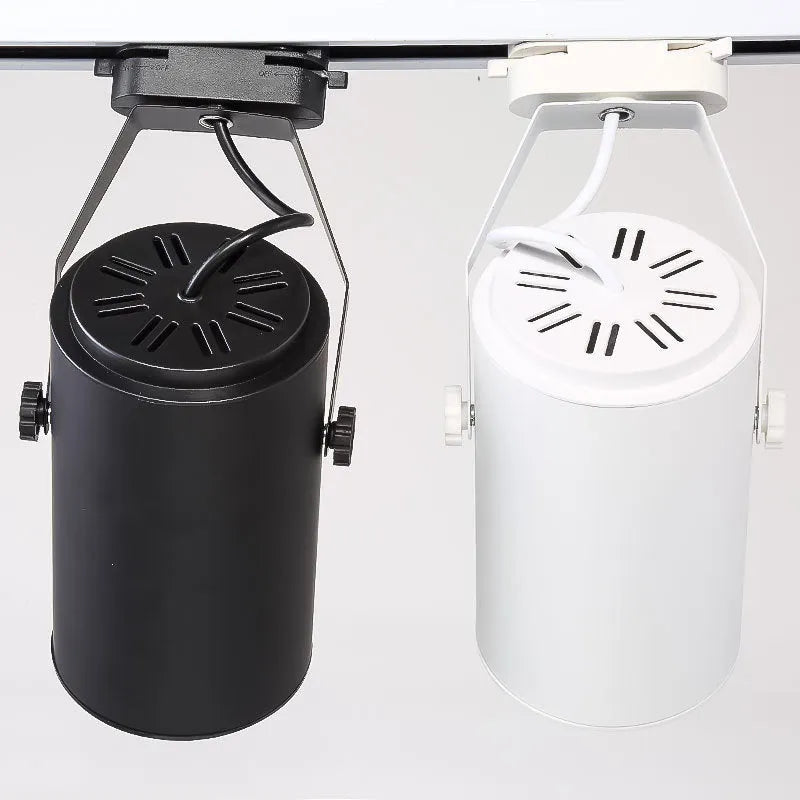 LED track spotlight with open-mounted slide design on black aluminium shell