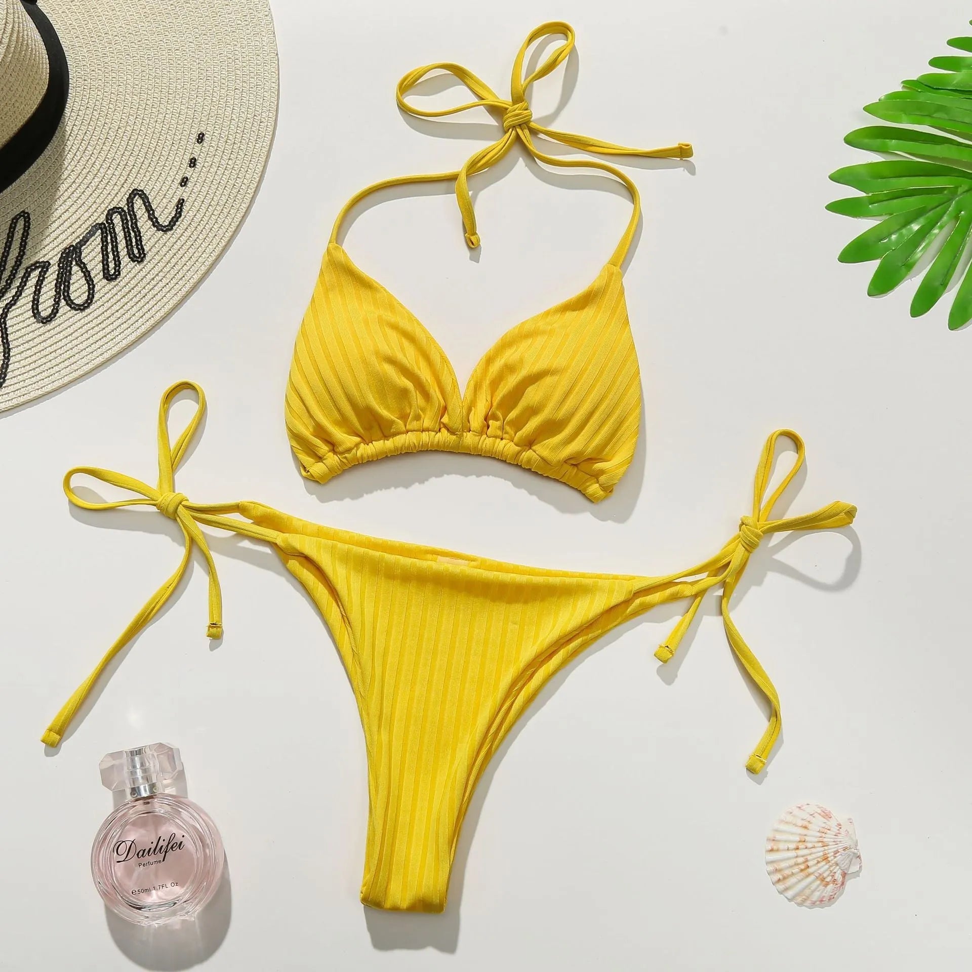 Women's solid colour polyester triangle bikini swimsuit in yellow or dark green