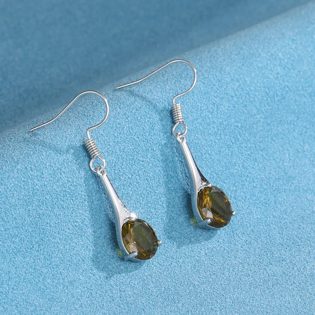 Olive green topaz colour drop-shaped earrings with minimalist retro style design