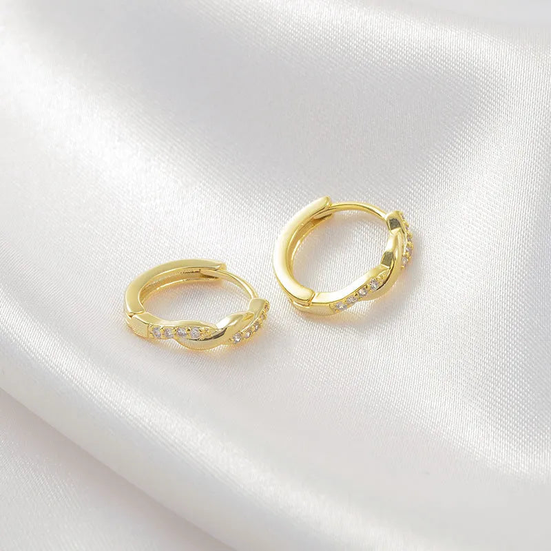 Geometric interwoven hemp rope earclip earrings for women in gold and silver colour options.