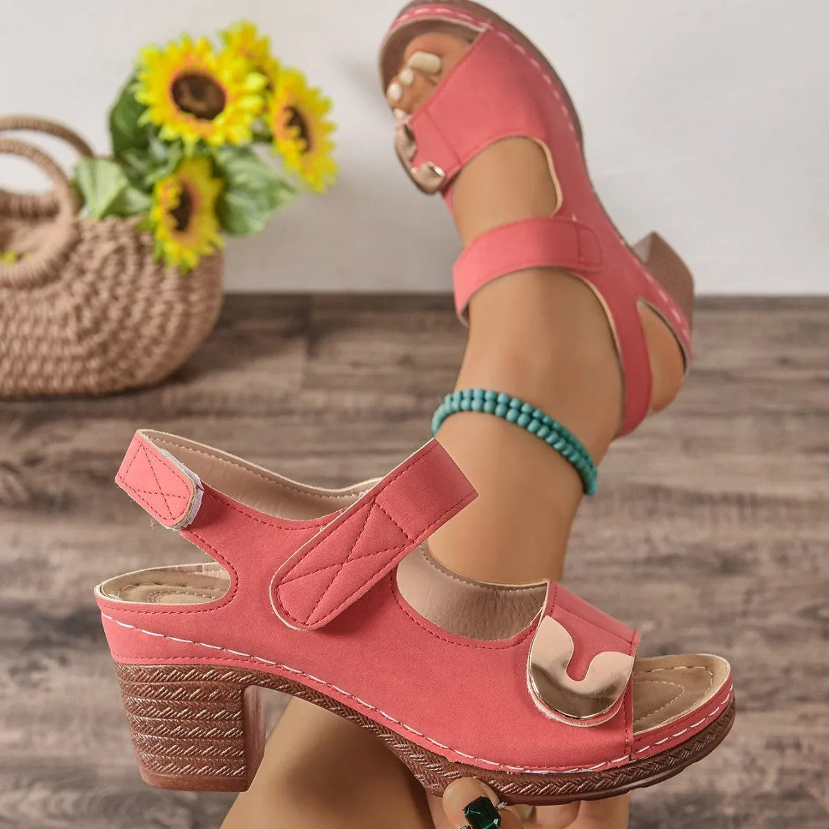 Women's light brown Velcro Roman sandals with round toe and adjustable strap on a rubber sole.