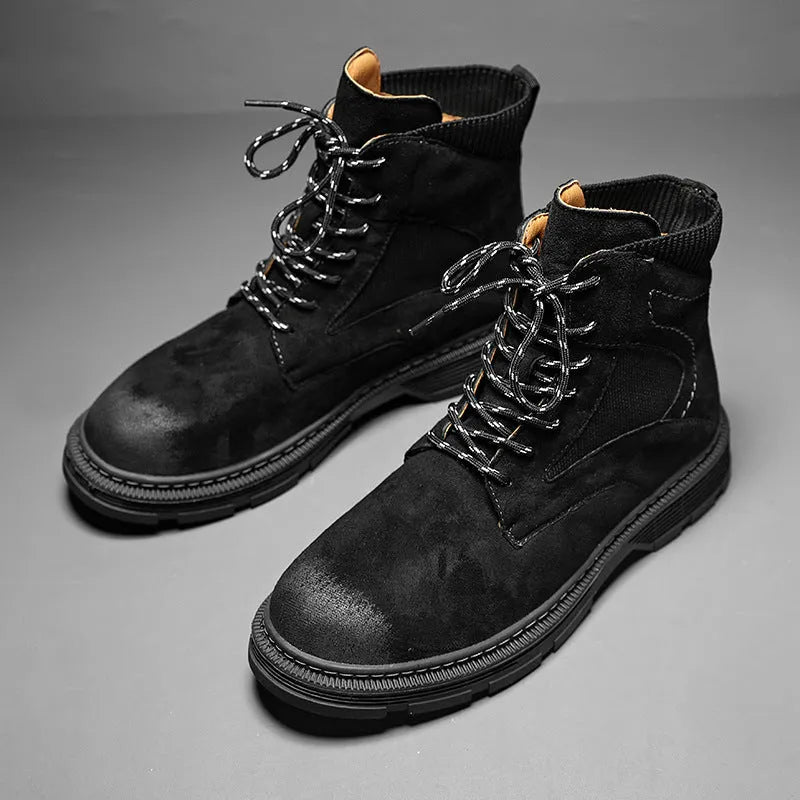 Men's vintage Martin boots in black with round toe, thick low heel, and rubber sole.