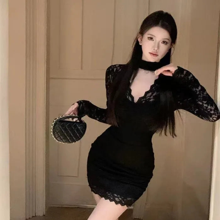 Women's black halter neck lace dress with floral pattern and A-line silhouette with inner petticoat