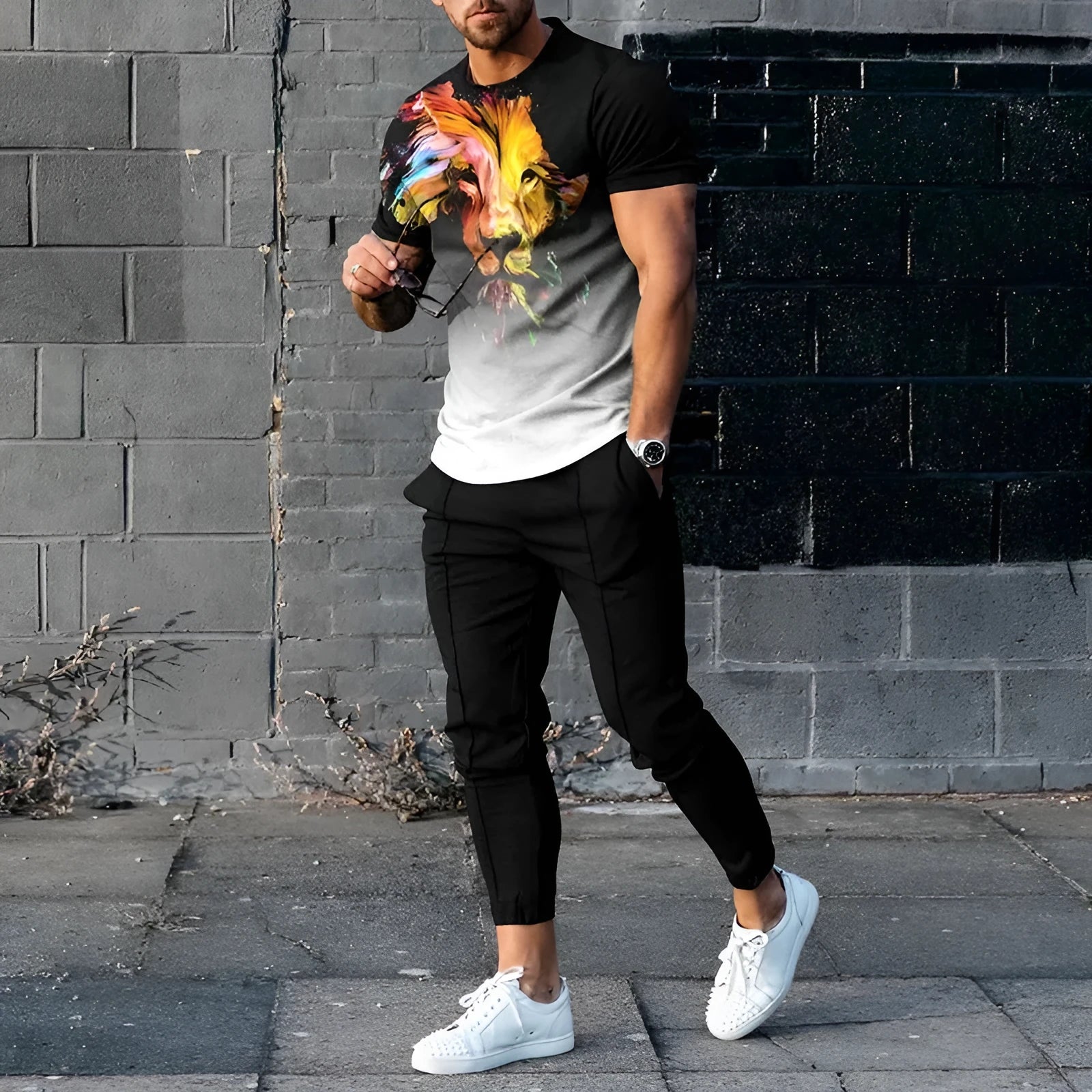 Men's short sleeve round neck T-shirt and matching trousers set in a light grey colour.