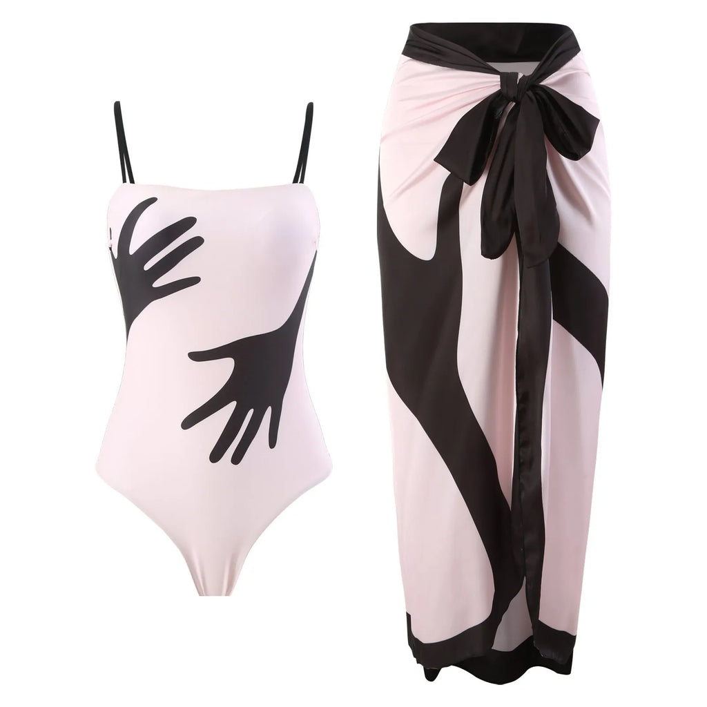 Women's patterned polyester swimsuit with attached tulle skirt in one-piece bikini design