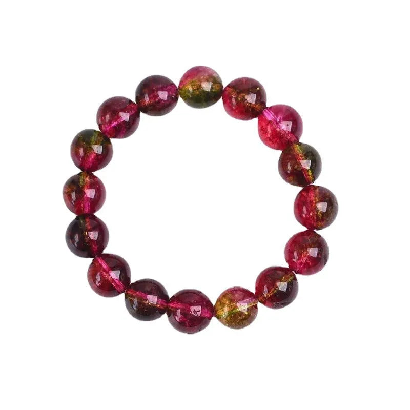 Women's handmade watermelon crystal bracelet showing pastoral design elements on wrist