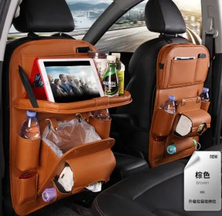 Black PU leather car seat back organiser with multiple pockets and a built-in trash can compartment