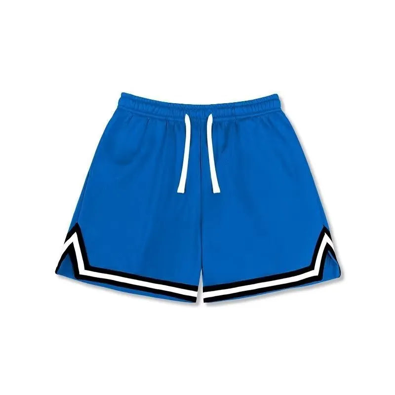 Man wearing loose fit grey polyester sports shorts on a summer day.