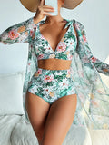 Women's multicolour print three-piece bikini set showing sports bra, shorts, and sunscreen shirt.