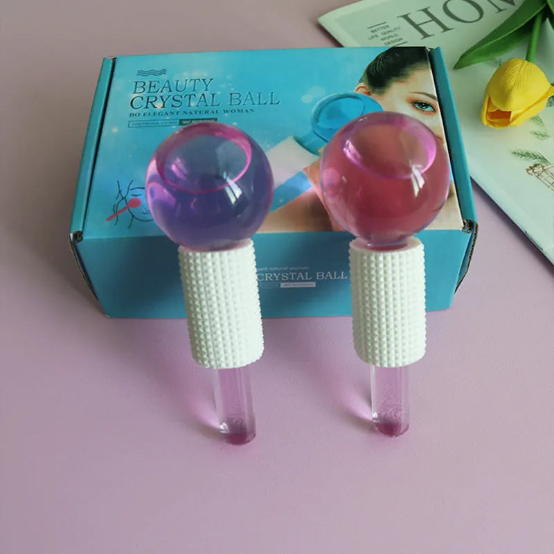 Set of two beauty ice wave ball face massage tools in purple flash finish on white background